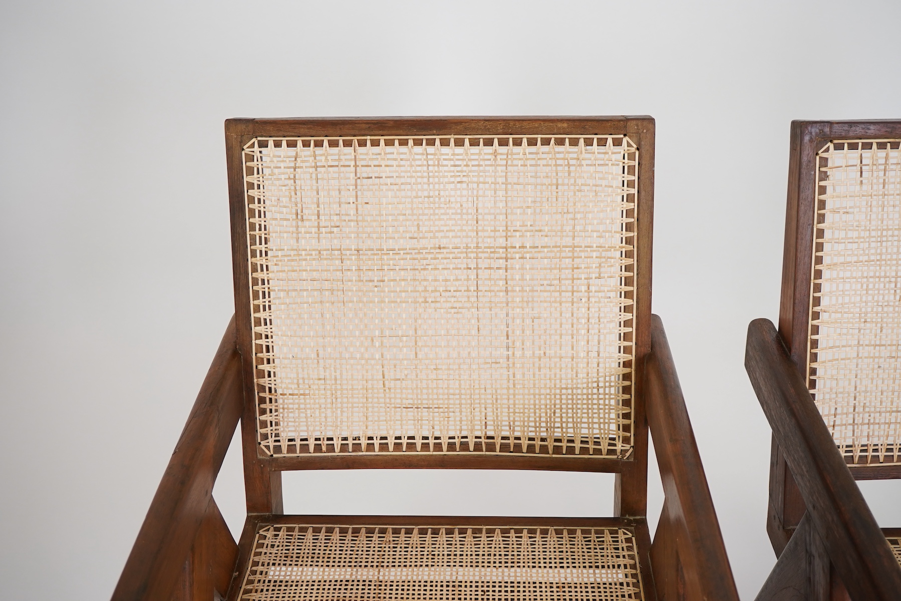 Pierre Jeanneret (Swiss, 1896-1967) for Chandigarh: A pair of cashew 'Easy' armchairs PJ-010105A